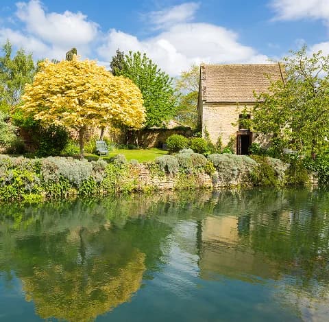 The Dovecote Cottage by the pond at Upper Court